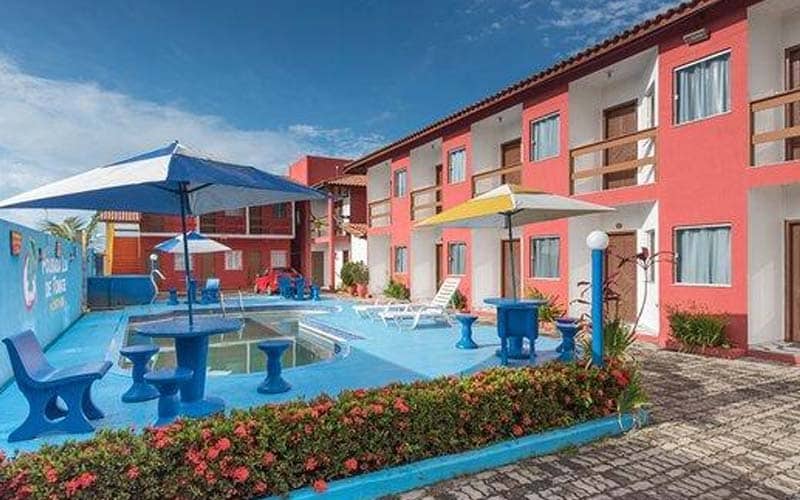 Piscina e quartos da Pousada Lua Tomate